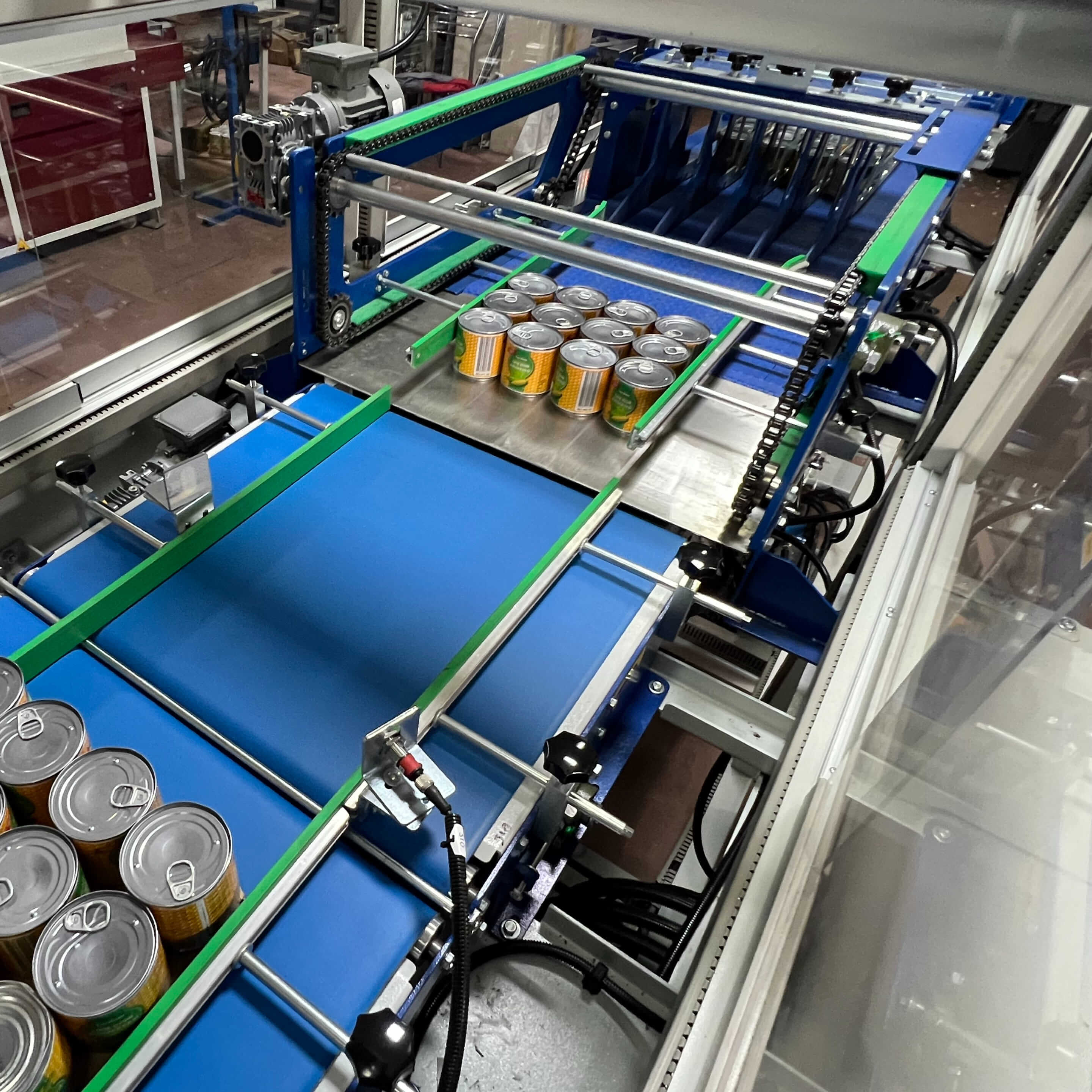 ERC Cardboard Feeding Automatic Shrink Packaging - Areté Group Packaging Machinery and Conveyor Solutions