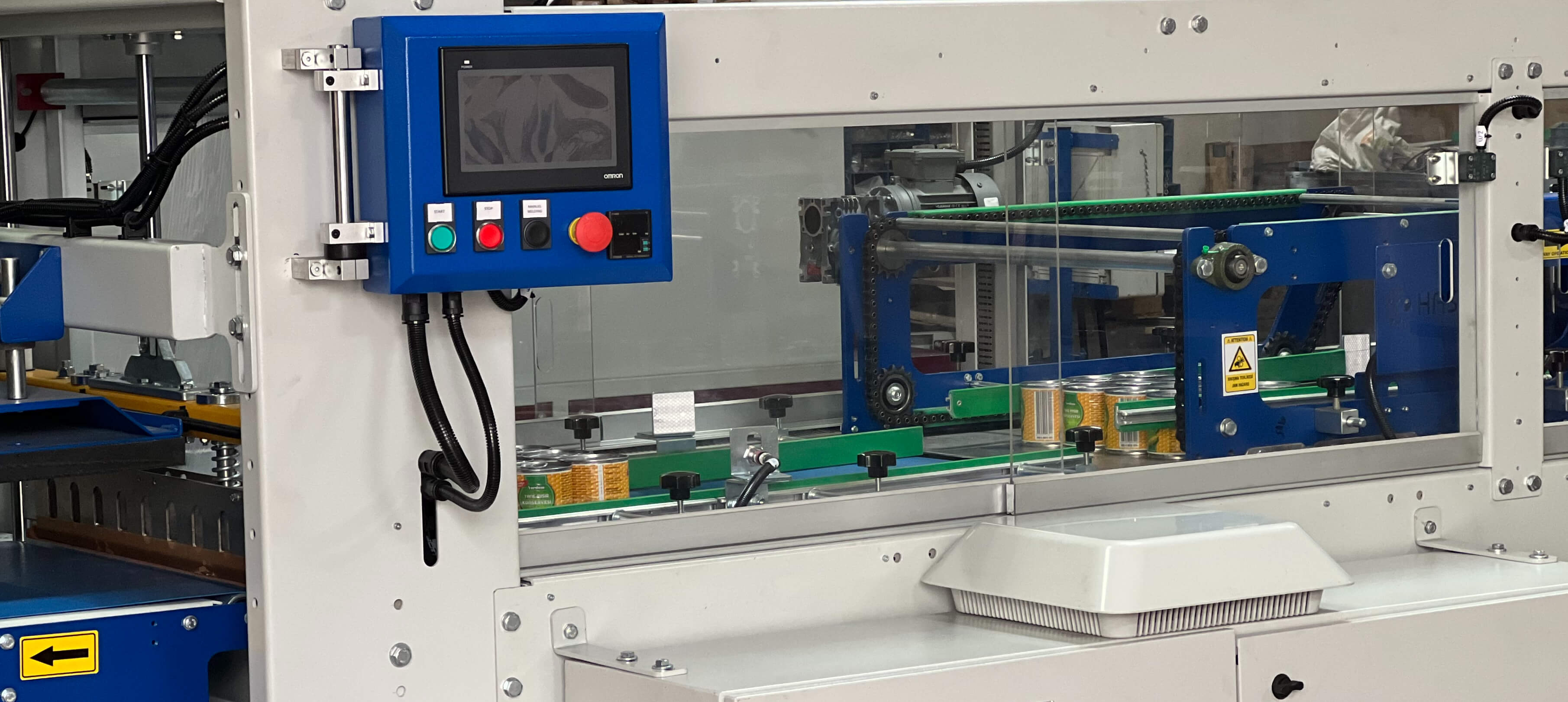 ERC Cardboard Feeding Automatic Shrink Packaging - Areté Group Packaging Machinery and Conveyor Solutions