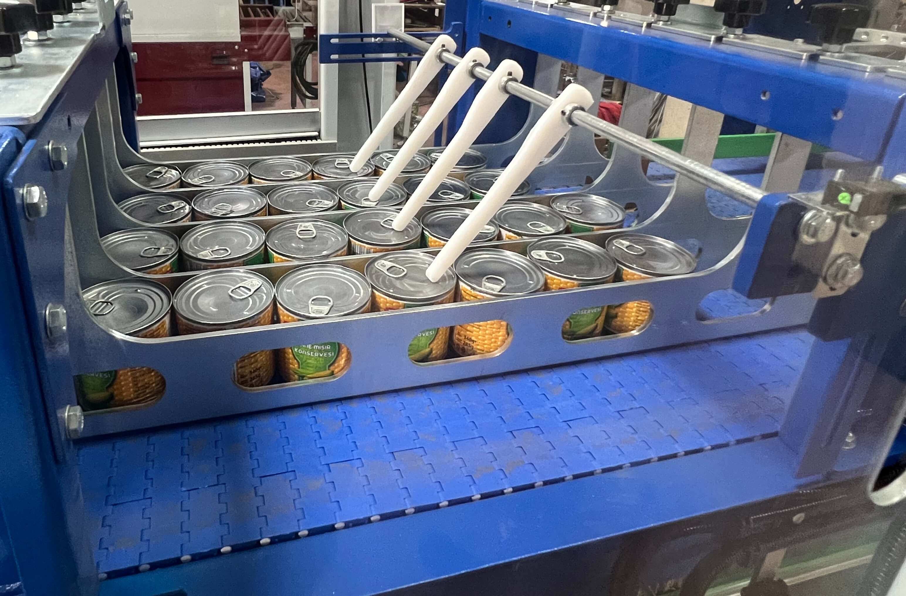 ERC Cardboard Feeding Automatic Shrink Packaging - Areté Group Packaging Machinery and Conveyor Solutions