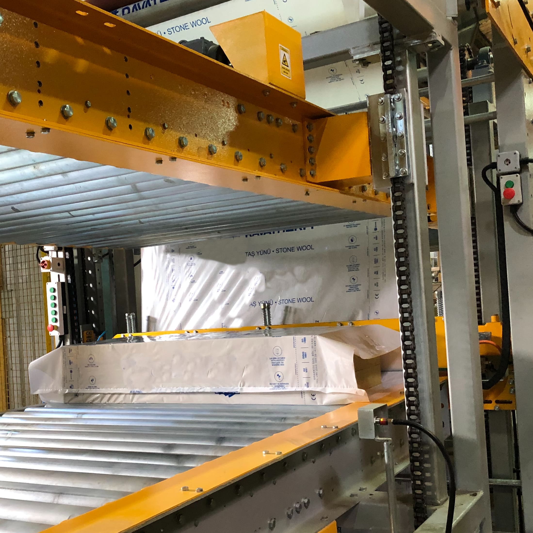 ERW Rock and Glass Wool Shrink Packaging - Areté Group Packaging Machinery and Conveyor Solutions