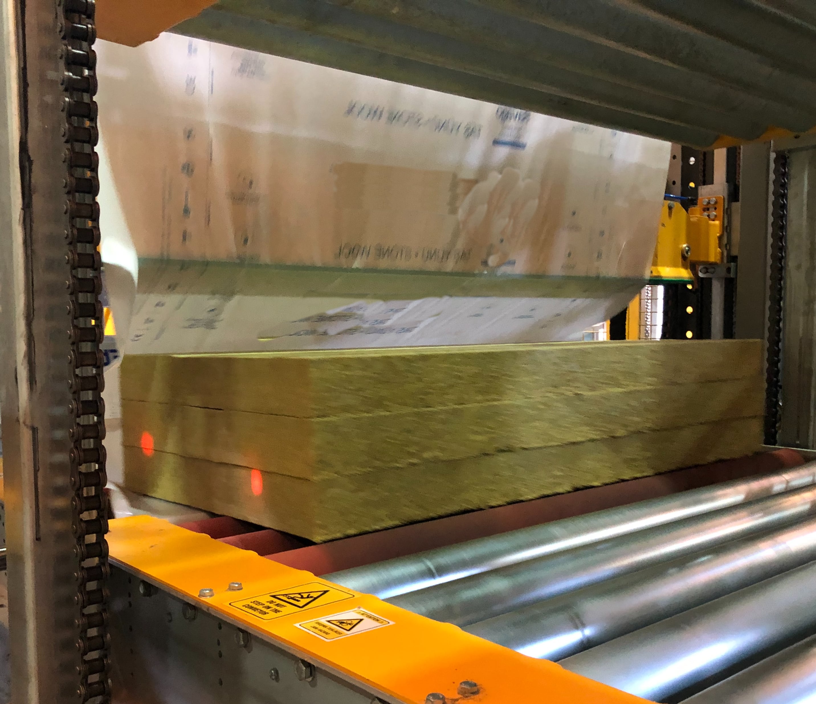 ERW Rock and Glass Wool Shrink Packaging - Areté Group Packaging Machinery and Conveyor Solutions