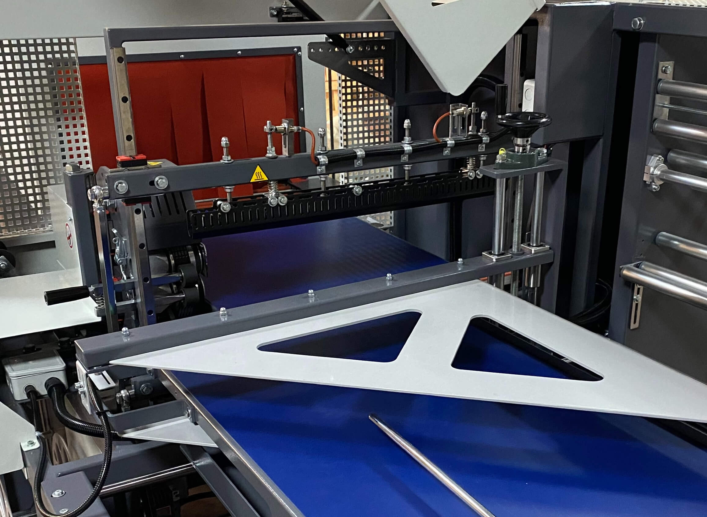 SLR Continous Motion Side Sealing & Shrink Tunnel - Areté Group Packaging Machinery and Conveyor Solutions