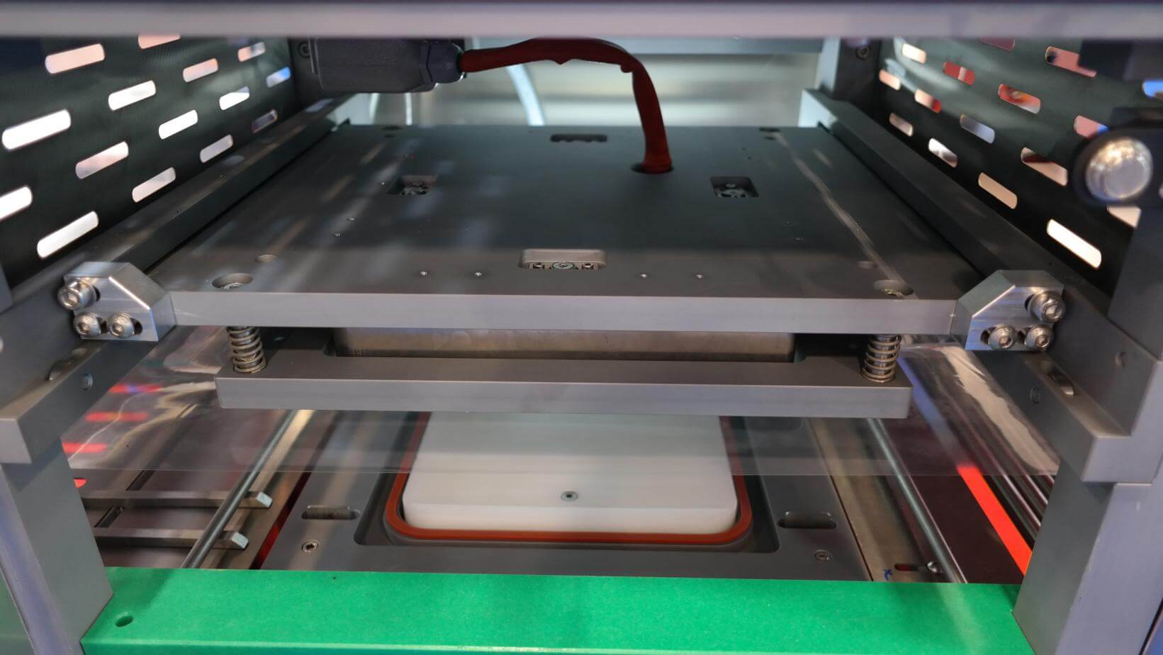 ATS 100E Automatic ECO Tray Sealer - Areté Group Packaging Machinery and Conveyor Solutions